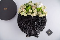 Black chocolate gift box with flower