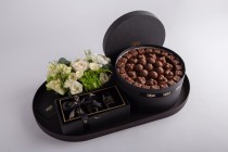 Black gift tray with candle